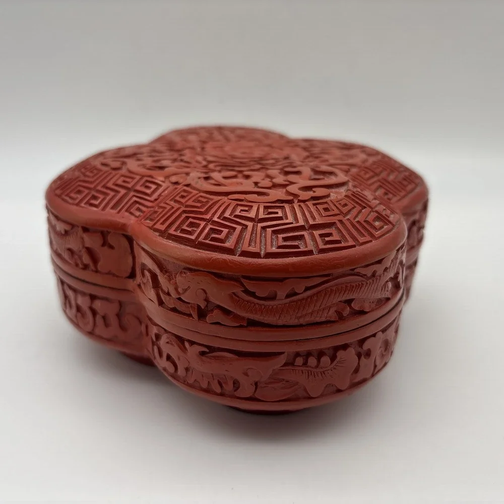 Red Cinnabar style detailed clover shaped decorative box black inside